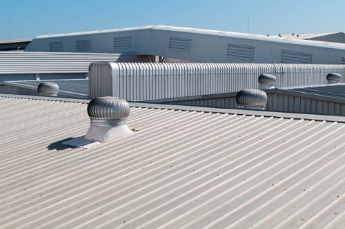 Close up of white metal commercial GAF roof